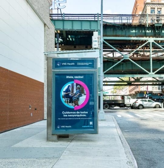VNS Health Bus Shelter.Qns Plz S.Spanish.Aug 2022