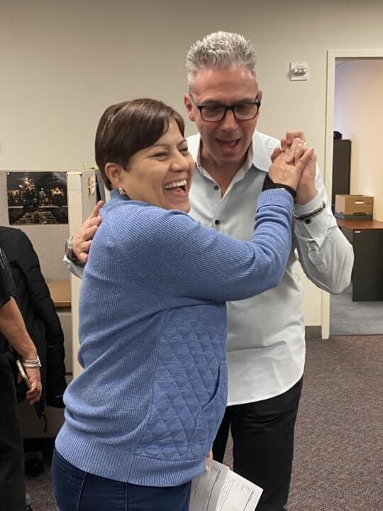 Jim and Ivette after high-5