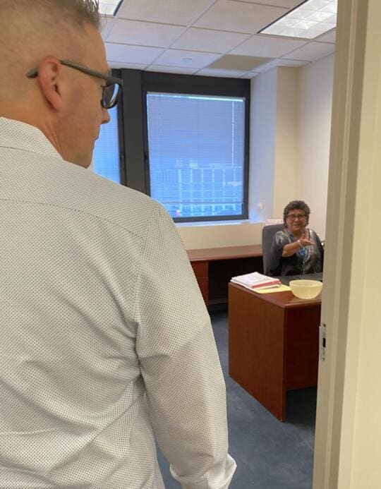 Jim at Rosa's office door